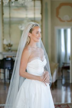 A radiant bride wearing a delicate tiara and strapless gown, glowing with timeless beauty. Wedding day perfection with a touch of classic charm. Delicate Tiara, Elegant Weddings, Curated Wedding, Wedding Hair Inspiration, Short Wedding Hair, Bridal Updo, Elegant Updo, Strapless Gown, Destination Wedding Planner