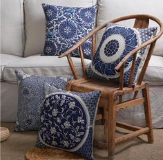 a living room filled with furniture and pillows