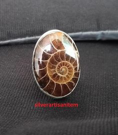 welcome to my silverartisanitem shop Ammonite Fossil Ring,Real Gemstone Ring,925 Sterling Silver Pendant Ammonite Fossil Silver Jewelry Handmade Ring,Gift For Friend,Conch Ring,Band Rings,Simple Ring, Description Gemstone :- Ammonite Fossil Style :- Ring Metal :- 925 Sterling Silver Handmade Item You will receive a Ring like the one in the pictures. This Ring have 925 Stamp. Suitable for use in everyday situations, or can also be used as a gift. Unique design will make a special attraction for t Conch Ring, Fossil Ring, Ammonite Fossil, Simple Ring, Silver Jewelry Handmade, Ring Metal, Gift For Friend, Rings Simple, Ring Band