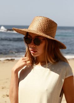 Our Catalina is a short-brim straw hat featuring a woven trim, a perfect sunny-weather staple. Ideal for those long days of sunlight featuring afternoons picnics and everything in-between. Lightweight Made from Straw *Sizes vary but measure about S/M: 21 IN M/L: 23 IN Casual Toquilla Straw Fedora For Warm Weather, Spring Coastal Boater Hat Made Of Toquilla Straw, Casual Toquilla Straw Boater Hat For Warm Weather, Casual Woven Toquilla Straw Boater Hat, Summer Fedora Panama Hat Made Of Palm Leaf, Casual Short Brim Straw Hat For Warm Weather, Spring Wide Brim Fedora, Casual Straw Hat With Short Brim For Warm Weather, Summer Curved Brim Boater Hat For Picnic