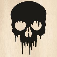 a wooden background with a black and white skull