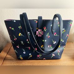 Almost Brand New Kate Spade Wildflower Collection. Well Maintained Bag. Rare Find. Open Top With A Turn Lock Clasp Closure. Size: 10”W * 9”H * 5”D Elegant Floral Print Shoulder Bag For Shopping, Elegant Floral Print Tote Bag, Elegant Everyday Shoulder Bag With Floral Print, Elegant Blue Bags With Floral Print, Chic Blue Floral Print Bag, Kate Spade Multicolor Spring Bags, Elegant Blue Floral Print Bags, Blue Floral Print Shoulder Bag For Everyday, Everyday Blue Floral Print Shoulder Bag