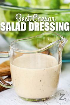 the best caesar salad dressing in a glass pitcher