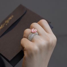 Everybody loves this ring. Don't think about the band size, just order your size. 6 will be a bit loose. 6.5 will be fit very well. 🌱Handcrafted ring 🌱Made of 925 silver (gold plating) and natural jade (not A), synthetic flower, not coral 🌱Authentic Korean jewelry 🌱Handmade in Korea 🌱Made to order 🌱Free standard shipping from Seoul Korea with tracking included 🌱Take approximately 10-30 days to arrive worldwide 🌱Each piece is thoughtfully designed and handmade by a highly skilled master a Fine Jewelry Enamel Open Ring For Gift, Pink Stackable Enamel Ring As A Gift, Pink Enamel Stackable Ring As Gift, Elegant Stackable Enamel Ring As Gift, Elegant Stackable Enamel Ring For Gifts, Round Gemstone Enamel Ring Gift, Enamel Open Ring With Gemstone For Gift, Round Enamel Ring With Gemstone For Gift, Modern Pink Ring For Anniversary