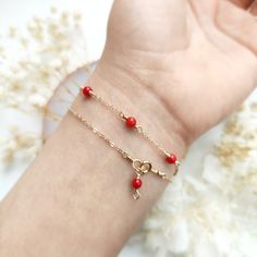 ✨ Red Coral Bracelet 14K Gold Filled, Rose Gold Filled, Sterling Silver Delicate Layering Bracelet, Birthstone Gift For Her ❤ Vibrant & energetic. Red coral is the best stone to wear for vitality, energy & ambition. Its bright red color symbolizes blood and the planet Mars which can be very powerful & energizing. It is believed to be effective in both prosperity & romantic love ❤ • Handmade in your preferred size. All metal parts are made with 14K Gold Filled, Rose Gold Filled or 925 Sterling Si Red Gemstone Bracelets As Gift, Red Gemstone Bracelets For Gift, Gift Red 14k Gold Bracelet, Red Gemstone Dainty Bracelets, Red Gemstone Dainty Bracelet, Red 14k Gold Dainty Bracelet, Red Bracelet With Adjustable Chain As Gift, Red Bracelet With Adjustable Chain For Gift, Elegant Red Bracelets With Adjustable Chain