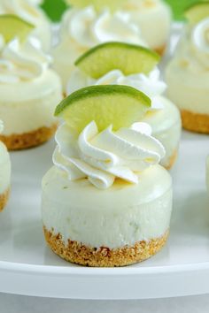 small desserts with lime and whipped cream on a white plate, ready to be eaten