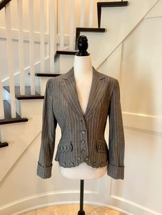 This blazer is very well constructed and has a nice tailored fit. It's the perfect jacket for casual day at the office - pair it with your jeans for a polished look! It's the details that make this jacket special - nice embroidery work, scalloped edges, interesting button details. Excellent quality and construction WORTH Size 6 96% cotton, 4% spandex Excellent condition - looks like it was never worn! Measurements (laid flat and buttoned) Chest: 16.5" (pit to pit) Waist: 16" across Length: 20" ( Perfect Jacket, Pinstripe Blazer, Grey Jacket, Office Attire, Fitted Blazer, Womens Blazers, Scalloped Edges, Work Office, Embroidery Work