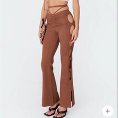 Edikted Cut Out Flare Plants- Brown Size: S I’m 5’2 And They Are Long, But Able To Be Tied And It Looks Just As Cute! Fitted Summer Bottoms With Cut-out Waist, Fitted Bottoms With Cut-out Waist For Night Out, Trendy Cotton Bottoms For Night Out, High Waist Stretch Bottoms With Cutout Details, Chic Cutout Bottoms For Spring, Spring Bottoms With Cutout Details, High Rise Pants For Summer Night Out, High Rise Pants For Night Out In Summer, Trendy Brown Summer Pants