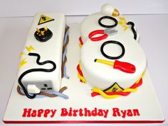 two birthday cakes with different types of items on them