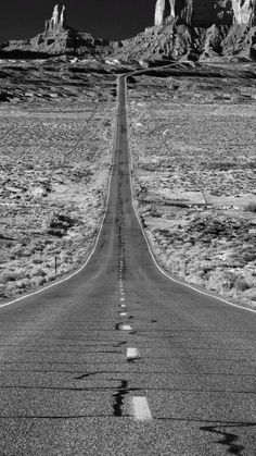 an empty road in the middle of nowhere