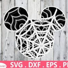 mickey mouse head cutout with spider web pattern on the front and back, in black and white