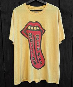 Rolling Stones tongue graphic on thin and soft tee. New print on recycled and dyed tee. Cotton. Marked size XL. Please check measurements below to ensure fit! Measurements taken flat across tee: Bust: 24" Length: 30.5" FREE DOMESTIC SHIPPING! *This is a pre-loved shirt that has been renewed, imperfections are noted as best as possible but please keep in mind that this is a one of a kind item and not identically mass-produced* [All sales final unless grossly misrepresented] New Print, Rolling Stones, Labour Day, Gender Neutral, Im Not Perfect, Bathing Beauties, Angeles, Adult Outfits, T-shirt