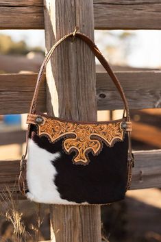 Experience the exquisite craftsmanship and timeless style with the Bogus Purse from Big Country's Western Wear. Made with premium materials, this purse is designed to complement your western wardrobe. Shop now and elevate your fashion game! Western Wardrobe, Big Country, Country Western, Unique Charms, Western Wear, Timeless Style, Fashion Games, Timeless Fashion, Shop Now