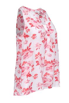 Get ready for sunshine and good times in this lightweight silk top from Joie. The vibrant white and pink floral print, V-neckline, and loose fitting make for a top that is perfect for warm weather. Dress it up with high-waisted trousers and flats for a business casual look. Size XS 100% Silk Pullover closure Two-button neckline closure Unlined V-neckline Sleeveless Bust 38” Waist 38' Shoulder to hem 26” Weather Dress, Pink Floral Print, High Waisted Trousers, Silk Top, Silk Printing, A Business, Warm Weather, Business Casual, Pink Floral