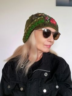 Green Wool Beanie Hat for Women Floral Embroidered Warm Slouchy Beanie This green embroidered beanie hat is designed and handmade by me. The wool crochet beanie is made of very soft olive green angora wool yarns, floral patches,sequins fabric,Preciosa glass beads. Hat trim circumference: About 61 cm/ 24 inches This winter boho woman beanie is very lightweight,stretchy and comfortable!Machine wash on a gentle program. This unique handmade hat could be your jewelry, fashion accessory and stylish a Green Hand Knitted Beanie One Size, Green Adjustable Crochet Beanie, Green Hand Knitted One Size Beanie, Hand Knitted Green Beanie One Size, Green Bohemian Crochet Beanie Hat, Green Brimmed Beanie, One Size Fits Most, Green Yarn Beanie Cap, Green Brimmed Beanie (one Size Fits Most), Green Hand Knitted Beanie Cap