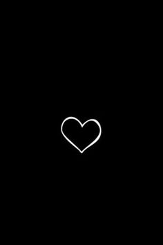 a black background with a white heart in the middle