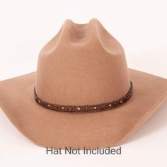 Description - One Size Fits All - Leather The Sonoma Hat Band is the perfect finishing touch to any cowboy hat. It's made of durable, high-quality materials that will last for years. The band is a rich brown color with beautiful bronze studs. The detailed design is eye-catching and unique. **Please note this is the hatband only** Shipping and Returns Orders generally arrive within 3-7 business days. All our hats come with a lifetime warranty. What this means is that even if you bought a hat over Luxury Custom Brown Hat Bands, Cheap Classic Hat Band For Spring, Cowboy Hat Band, Cowboy Hat Bands, American Hat Makers, Detailed Design, Hat Band, The Band, Cowboy Hat