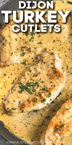 the chicken is covered in gravy and served in a skillet with parsley