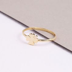 "ABOUT PRODUCT This 14K Yellow Gold Four Leaf Clover Ring is suitable gift for girlfriend, mom and her. You can even buy as a birthday gift for your friends or anniversary gifts, If you want to add a special note we can write for you and put to inside of package. We manufacture our jewelry pieces with carefully and after production we double checking in quality control department. Our main idea is keep our items for daily wearing especially for minimalist jewelry pieces. 14K Yellow Gold Four Lea Mother's Day Gift Rings In Fine Jewelry Style, Mother's Day Fine Jewelry Rings As Gift, 14k Gold Fine Jewelry Stackable Rings Gift, Mother's Day Fine Jewelry Rings For Gift, Mother's Day Fine Jewelry Rings Gift, Yellow Gold Flower Ring With Birthstone For Gift, Mother's Day Fine Jewelry Rings, Mother's Day White Gold Rings Gift, 14k Gold Flower Ring As A Gift