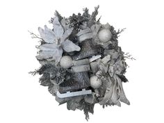 a wreath with silver and white decorations on it