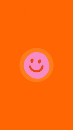 an orange background with a pink smiley face