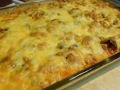 a casserole dish with meat and cheese in it