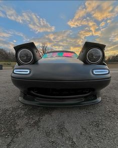 the rear end of a car with speakers on it