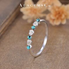 "🌸One of a Kind - No Opal is the same, get your unique fine jewelry from AUSGEMSCo. **All rings are handmade and shipped in Australia. If you don't like the stone in the picture, please contact me to change it to ANY STONE you like. Dainty Turquoise Wedding Band Women Vintage Flower Ring White Gold Stacking Ring Unique Floral Matching Band Half Eternity Anniversary Gift check the Opal and Pearl wedding band: https://www.etsy.com/listing/1449789491 🌸ITEM DETAILS Main Stone: Natural Turquoise, Round Cut Size: 1.7mm Ring Band: 1.3mm Metal Choice: 925 Sterling Silver(Plated 18K Yellow/Rose/White Gold); 10K/14K/18K Solid Gold (Rose, White, or Yellow) or Platinum 🌸Order & Rush Order: Every single piece of AUSGEMSCo jewelry is made to order, and our standard production time is 2 to 3 weeks fro Turquoise Diamond Anniversary Jewelry, Elegant Turquoise Diamond Anniversary Ring, Emerald Stackable Wedding Jewelry, Emerald Multi-stone Wedding Jewelry, Stackable Emerald Wedding Jewelry, Wedding Emerald Stackable Jewelry, White Emerald Jewelry For Wedding, White Emerald Wedding Jewelry, Turquoise Prong Setting Jewelry For Wedding