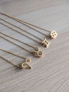 Gold Zodiac Sign Charm Necklace As Gift, Gold Zodiac Sign Charm Necklace For Gift, Gold Charm Necklace With Zodiac Sign For Gift, Gold Zodiac Sign Pendant Necklaces, Gold Zodiac Pendant Necklace, Gold Zodiac Sign Pendant Charm Necklace, Gold Zodiac Sign Celestial Necklace, Gold Zodiac Sign Necklace, Gold Zodiac Celestial Necklace