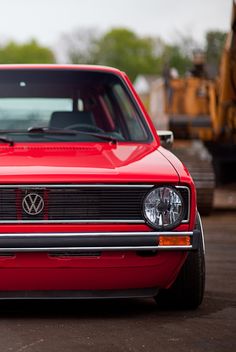 a black and white photo of a volkswagen car