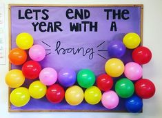 a bulletin board with balloons attached to it that says, let's end the year with a young