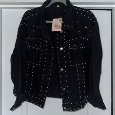 Womens Embellished Black Jean Jacket. New With Tags Trendy Black Studded Outerwear, Trendy Long Sleeve Outerwear With Studs, Trendy Studded Long Sleeve Outerwear, Spring Long Sleeve Outerwear With Rhinestone Rivets, Trendy Studded Outerwear For Fall, Trendy Studded Fall Outerwear, Party Outerwear With Studs And Long Sleeves, Edgy Embellished Long Sleeve Outerwear, Black Long Sleeve Outerwear With Rhinestone Rivets