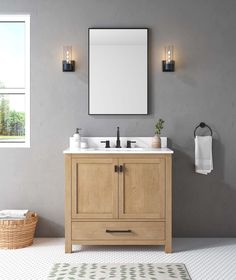 a bathroom with two sinks and a mirror on the wall