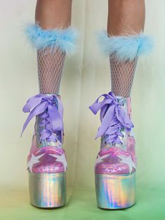 Meet your new favorite cosmic glam rock platforms! There pink holographic boots are worn by the cosmic disco fairies that live up in the clouds of Jackalope Land. These Disco Stardust Boots feature a holographic pink PVC outer, complete with sparkling white glitter stars and a silver holographic heel. The hand-carved wooden heels add just the right amount of height, while the low arch design keeps them comfy for long periods of wear. These handmade platform ankle boots are inspired by the magic Cosmic Disco, Holographic Boots, Flaming Dragon, Holographic Heels, Pink Pvc, Up In The Clouds, Headpiece Accessories, Pink Holographic, Wooden Heels