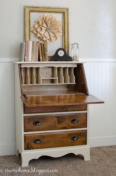 an old desk has been refinished with new paint and wax to make it more beautiful