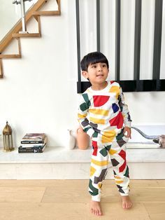 One of our customers' favorite items. Featuring a playful and vibrant print, this loungewear shirt and pants set is made with 100% organic cotton and comfy for wild kids to be kids at home or even outside. . Machine wash cold, hang dry or tumble dry low Recommend a size up if you prefer a loose fitSize 4-6 joggers come with side pockets and adjustable drawstring Model is 5 years old wearing 6 Shirt And Pants Set, Kids At Home, Kids Pajamas, Shirt And Pants, Baby Bag, British Indian, Summer Sale, Kids House, Pants Set