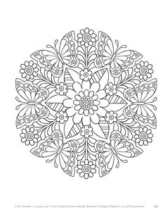 a black and white circular design with flowers