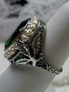 Green Emerald Ring, Sterling Silver Leaf Filigree, Pearl Frame, Vintage Jewelry, Silver Embrace Jewelry Exquisite Green Emerald Sterling Silver Ring, Classic Jewelry With May Birthstone Gemstone Accents, Formal Green Emerald Cut Crystal Ring, Formal Green Emerald-cut Crystal Ring, Unique Green Jeweled Jewelry, Elegant Green Promise Ring, Exquisite Green Ring For Anniversary, Elegant May Birthstone Crystal Ring, Classic Green Crystal Ring In Sterling Silver