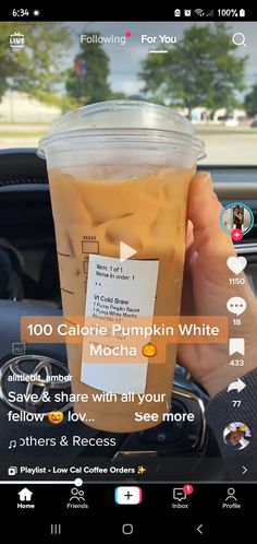 someone is holding up a cup of coffee in their car with the caption, 10 calorie pumpkin white mecha