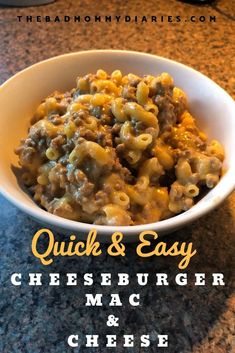 a white bowl filled with macaroni and cheese on top of a granite counter