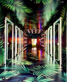 an instagram photo taken from the inside of a building with palm trees and lights