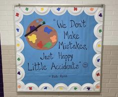 a bulletin board with an image of a paint palette and words that read, we don't make mistakes just happy little accents