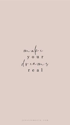 the words make your dreams real written in black ink on a pink background with a white border