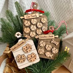 some cookies are hanging from a christmas tree