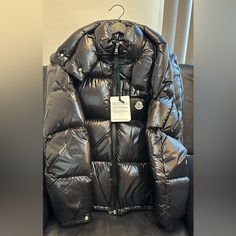 Brand New Men’s Puffer Jacket Authentic Luxury Black Puffer Jacket With Detachable Hood, Luxury Black Duck Down Outerwear, Luxury Black Down Puffer Jacket, Luxury Black Hooded Puffer Jacket, Luxury Down Outerwear For Streetwear, Luxury Duck Down Outerwear, Designer Black Puffer Outerwear, Luxury Puffer Outerwear, Designer Down Puffer Jacket