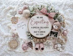 a baby announcement surrounded by teddy bears and other items on a white blanket with the words, we are expecting a special delivery due