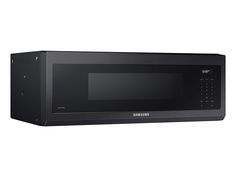 a black samsung microwave oven with the door open and buttons on it's side