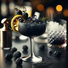 an alcoholic cocktail garnished with blackberries and lemon