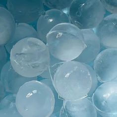 ice cubes that are sitting in the water and have been turned into something blue