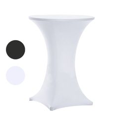 a white table with black and white circles around it